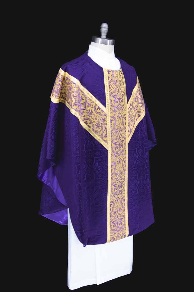 A violet chasuble with a wide gold orphrey, seen from the side