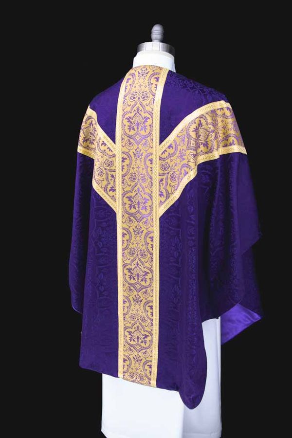 The back of a violet chasuble with a wide gold orphrey