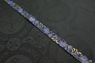 Royal blue and gold floral jacquard ribbon trim on black ground, 1 inch wide