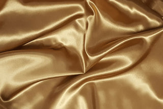 Eminence Satin fabric smooth finish close up of premium polyester satin fabric liturgical lining material. Also for formal wear, evening and bridal. 