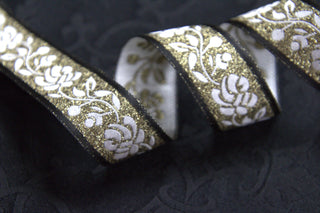 Black Gold and White Rose Jacquard Trim displayed on Black ecclesiastical brocade fabric