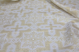White and gold Tintern liturgical brocade with crosses and eight-pointed stars in a geometric diaper pattern full repeat