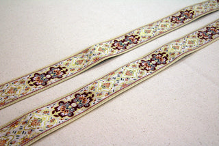 Detail of Abbey Rose floral jacquard ribbon in burgundy, rose, ivory and gold