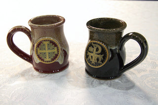 The Crusader's Cup in both glazes, one showing the Jerusalem Cross and one the Chi Rho