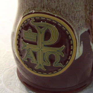 Close view of the pressed Chi Rho medallion
