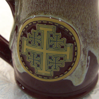 Close view of the pressed Jerusalem Cross medallion