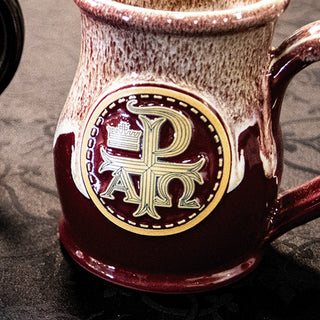 Close view of the pressed Chi Rho medallion