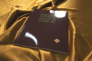Embroidery for Church Guilds: Burgundy cover on gold satin.