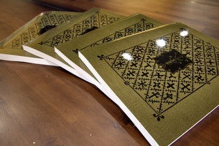 A Manual of Church Decoration and Symbolism by Rev. Ernest Geldart, olive green cover with a diaper pattern of crosses