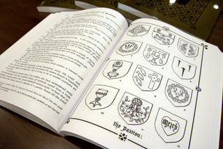 Plate of heraldic shields of the Passion showing the chalice, nails, crown of thorns and Mercy