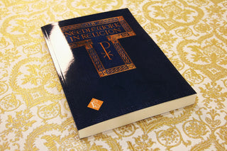 Needlework in Religion: Dark blue cover with gold lettering and a Chi Rho symbol.