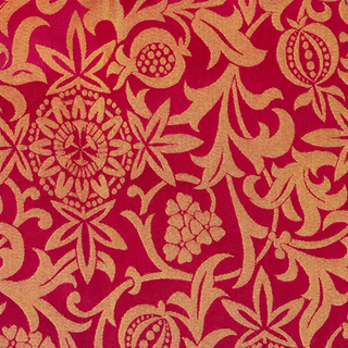 Passion Flower brocade in Red and Gold with repeating woven flowers and scrolling foliage.
