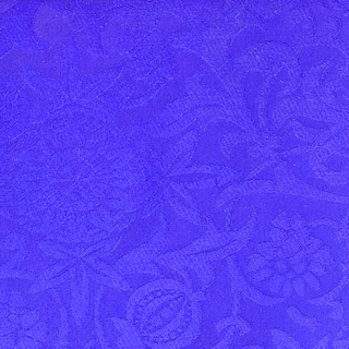 Passion Flower brocade in Violet with repeating woven flowers and scrolling foliage.