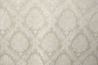 Large scale floral and scrollwork pattern on Ravenna Ivory Brocade fabric