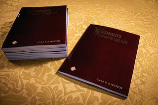 Vestments and How to Make Them: Stacked copies beside a single front cover.