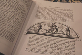 The Vestments of the Church by W. B. Marriott: Open pages with an illustration of early Christian worship.