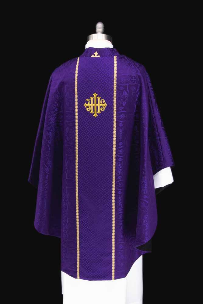 The back of a violet chasuble with an IHS between gold orphreys