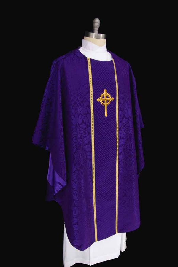 A violet chasuble with a small gold cross between gold orphreys